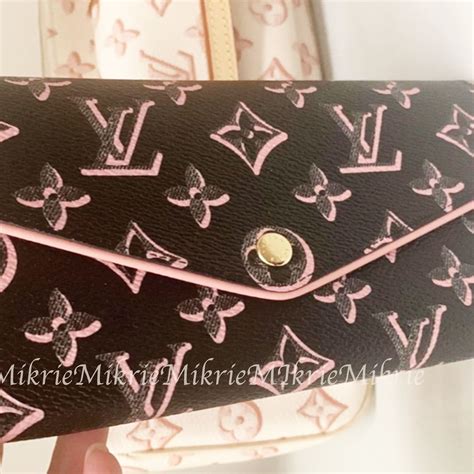 lv sarah wallet monogram|More.